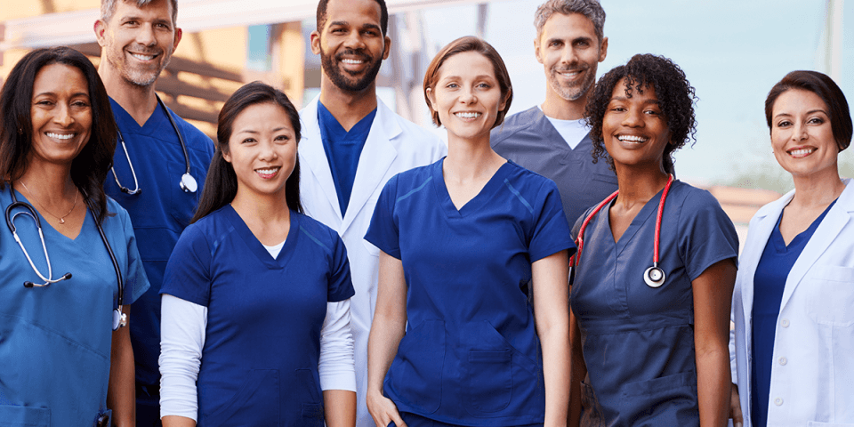 friendly-team-of-nurses-in-medical-outfits